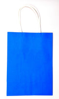 Blue paper bag with white handles on a white background