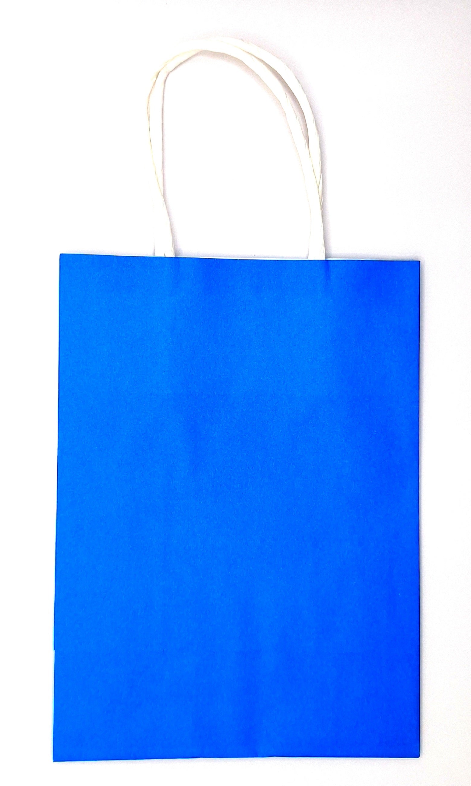 Blue paper bag with white handles on a white background